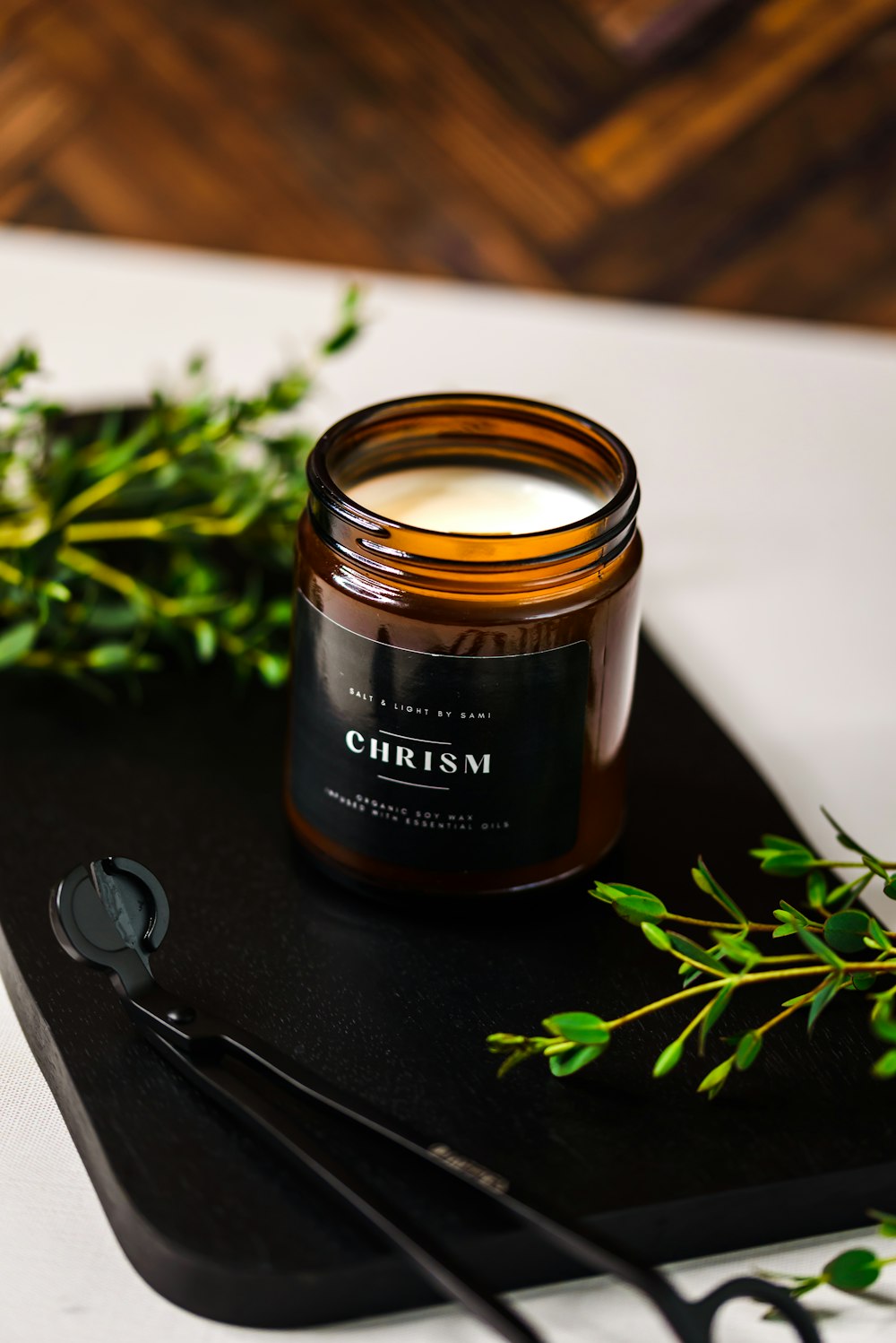 a jar of cream sitting on top of a cutting board