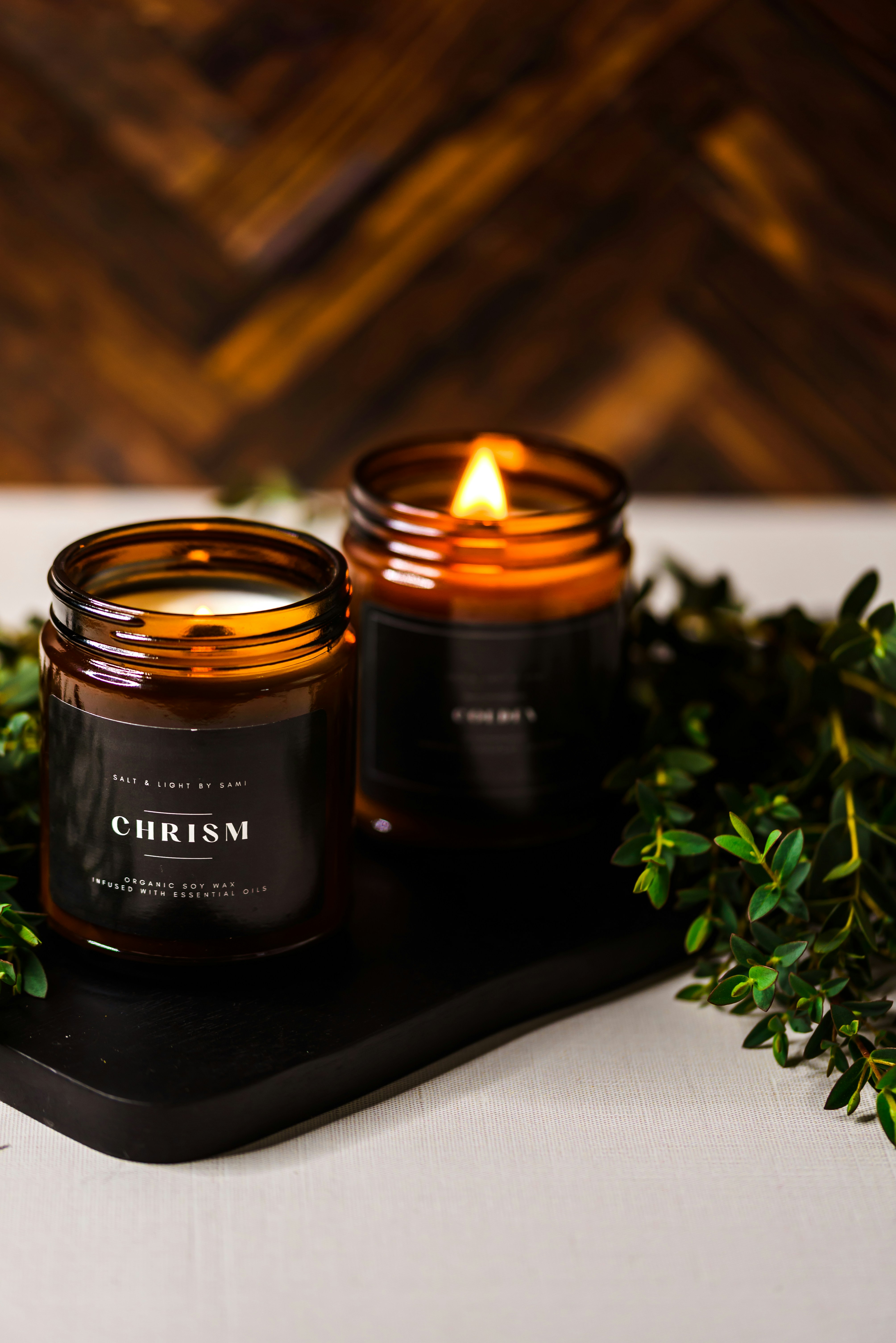 a couple of candles sitting on top of a table