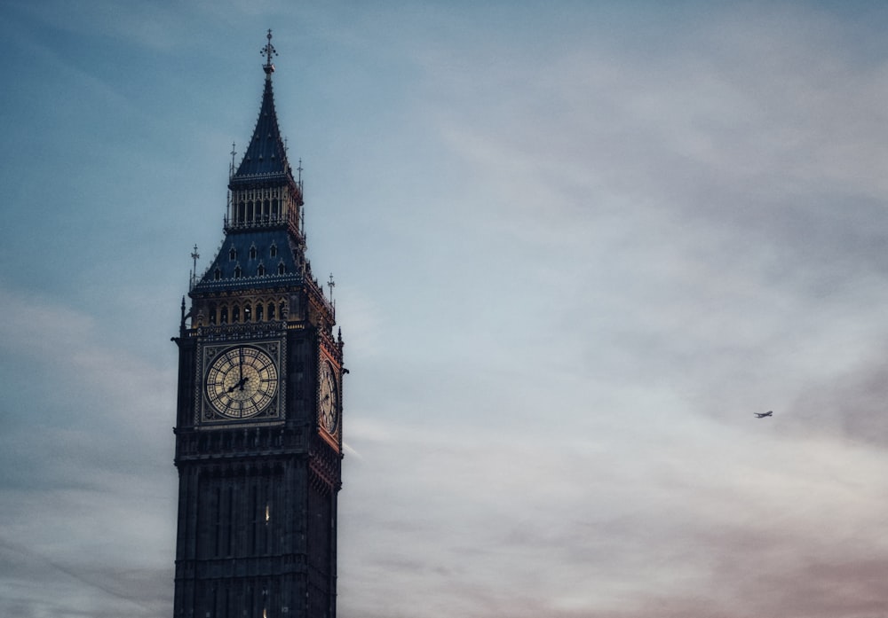 a tall clock tower with a sky background