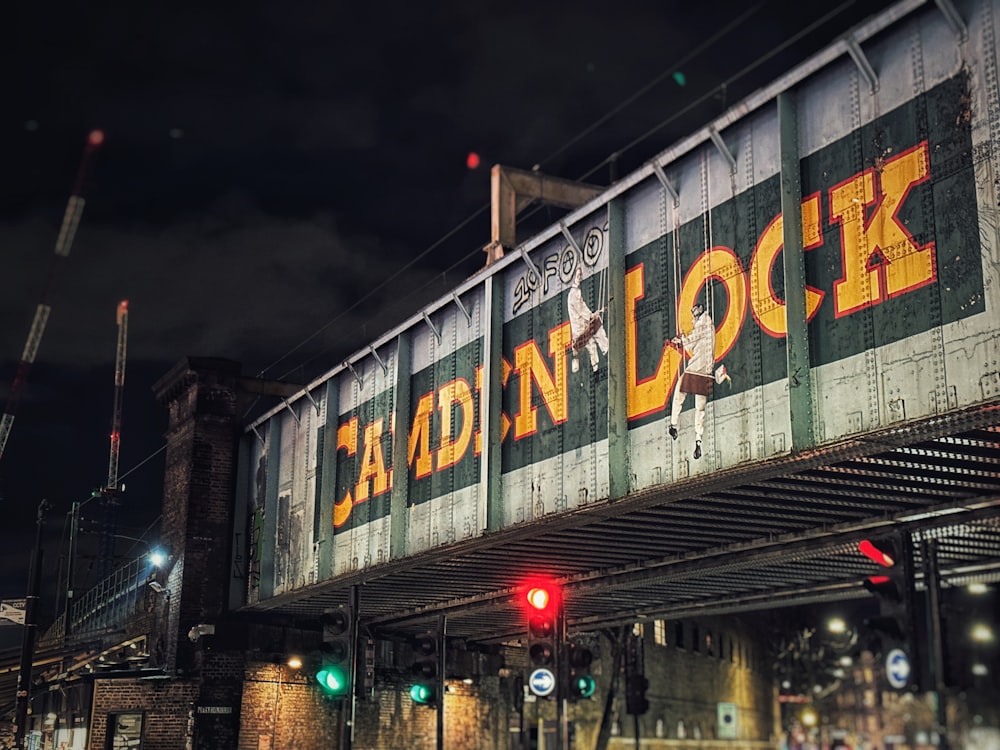 a train crossing over a bridge that reads lock lane