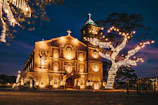 The church sanctuary beautifully lit during an evening worship session.