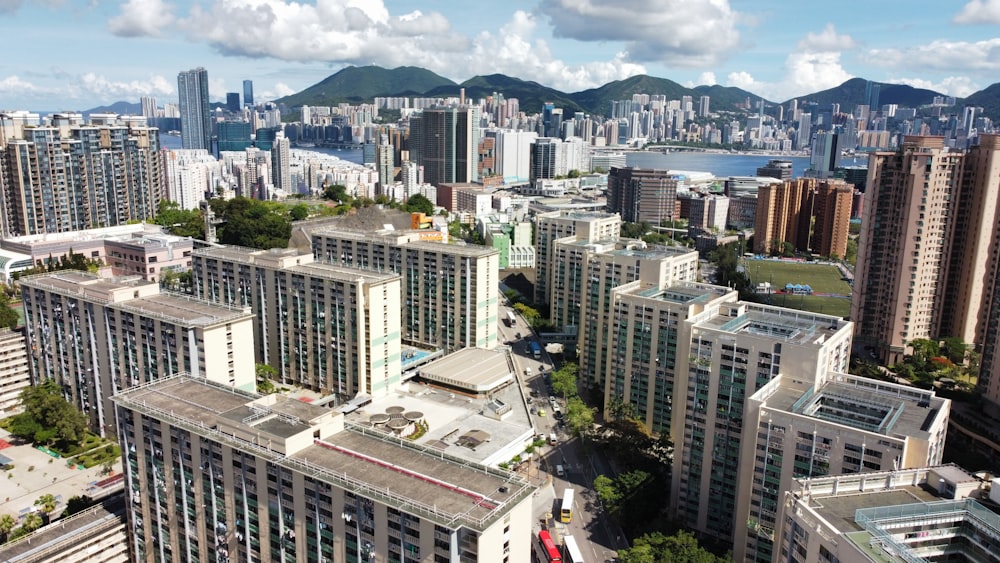 an aerial view of a city with tall buildings