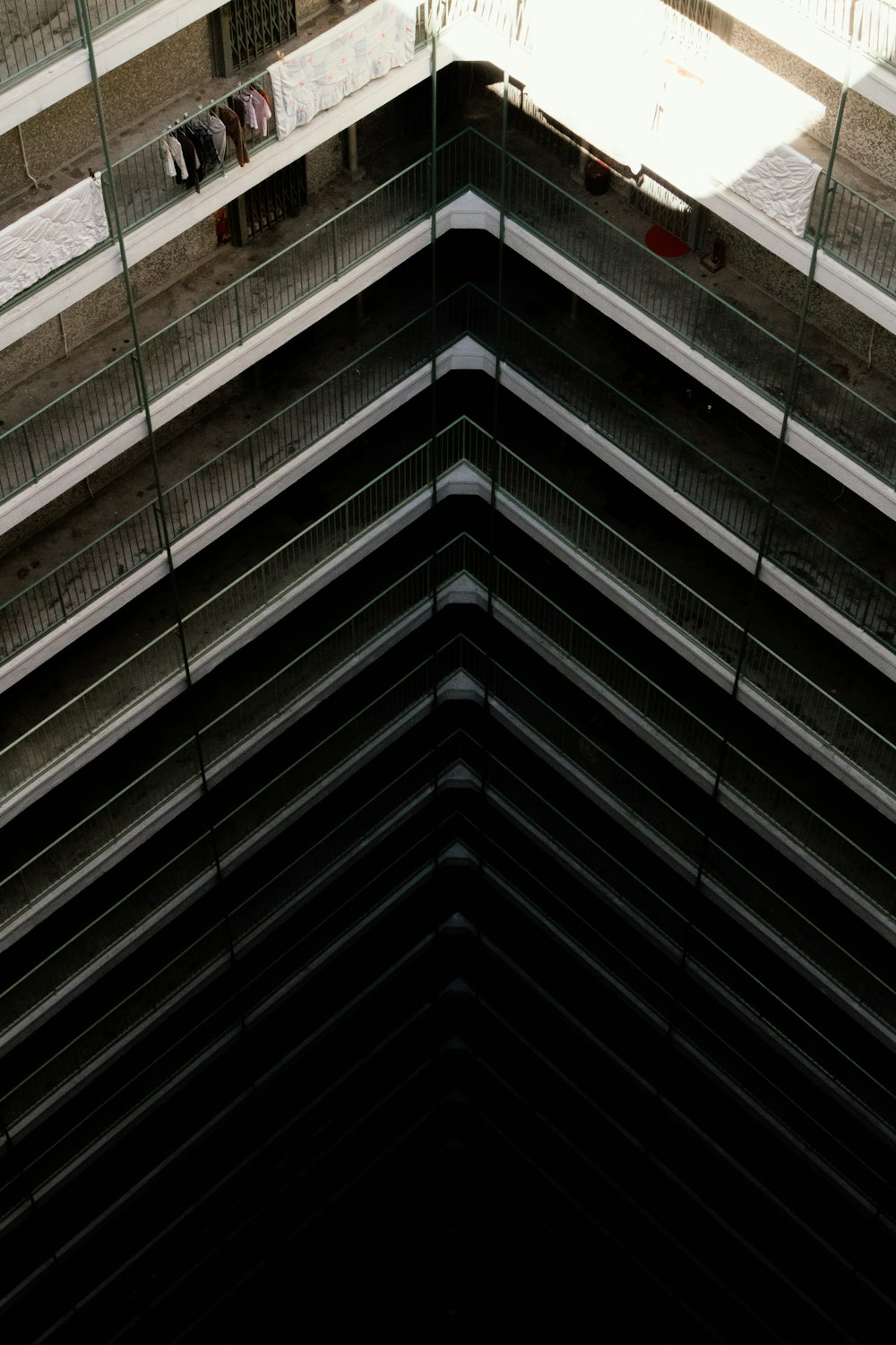 a view of a very tall building with a clock on it's side