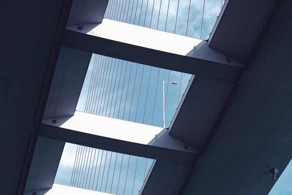the underside of a building with a sky background