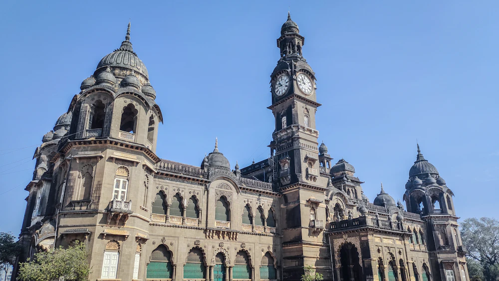 A historic clock-tower building in Kolhapur