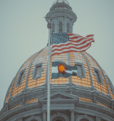 a large dome with a flag on top of it