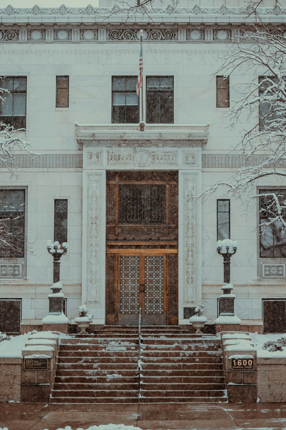 a large white building with steps leading up to it