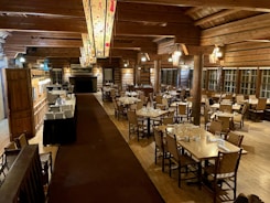 The dining area of the Pleasantview Gem Inn with a warm ambiance.