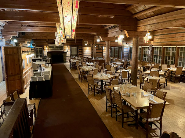 Friendly staff serving hearty Valaisan dishes in the chalet-style dining room.