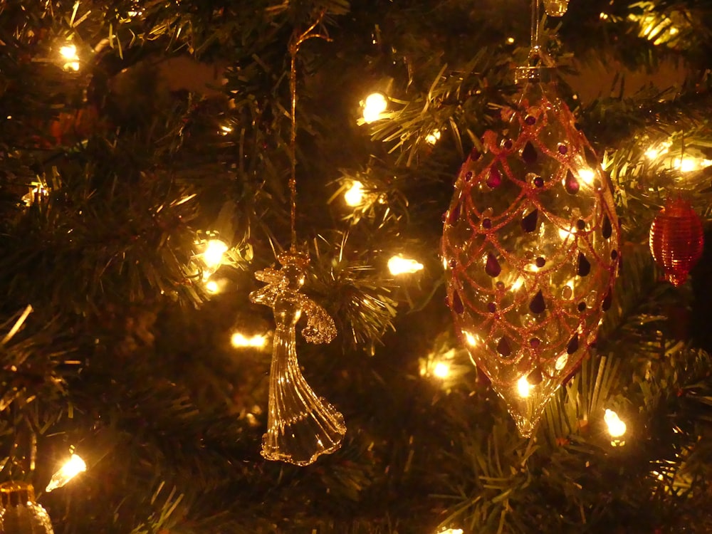 a close up of a christmas tree with lights