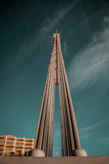 Wide shot of a newly built bridge with clear blue sky background