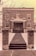 An old brick courthouse building with a symmetrical facade, featuring tall windows and a central entrance marked by a sign. The exterior landscape includes a path bordered by brick pillars leading up to several steps, and bare tree branches are visible in the foreground.