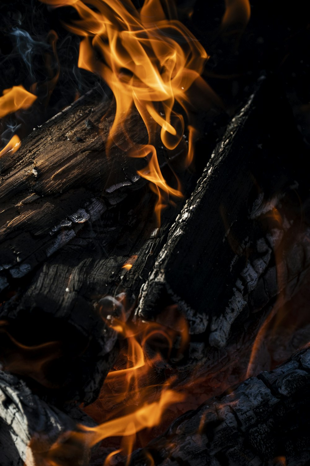 a close up of a fire in a fire pit