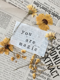 a piece of paper that has some flowers on it