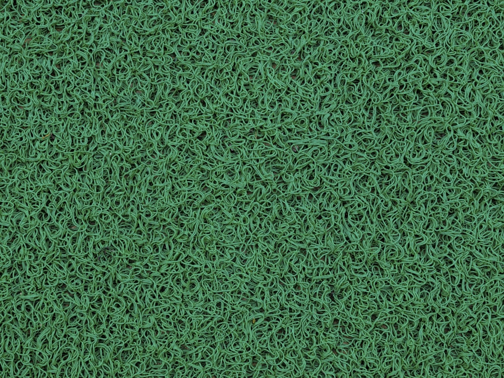 a close up of a green grass texture