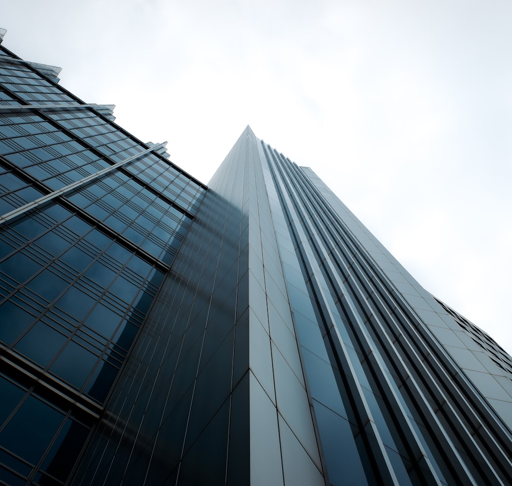 a tall building with a sky background