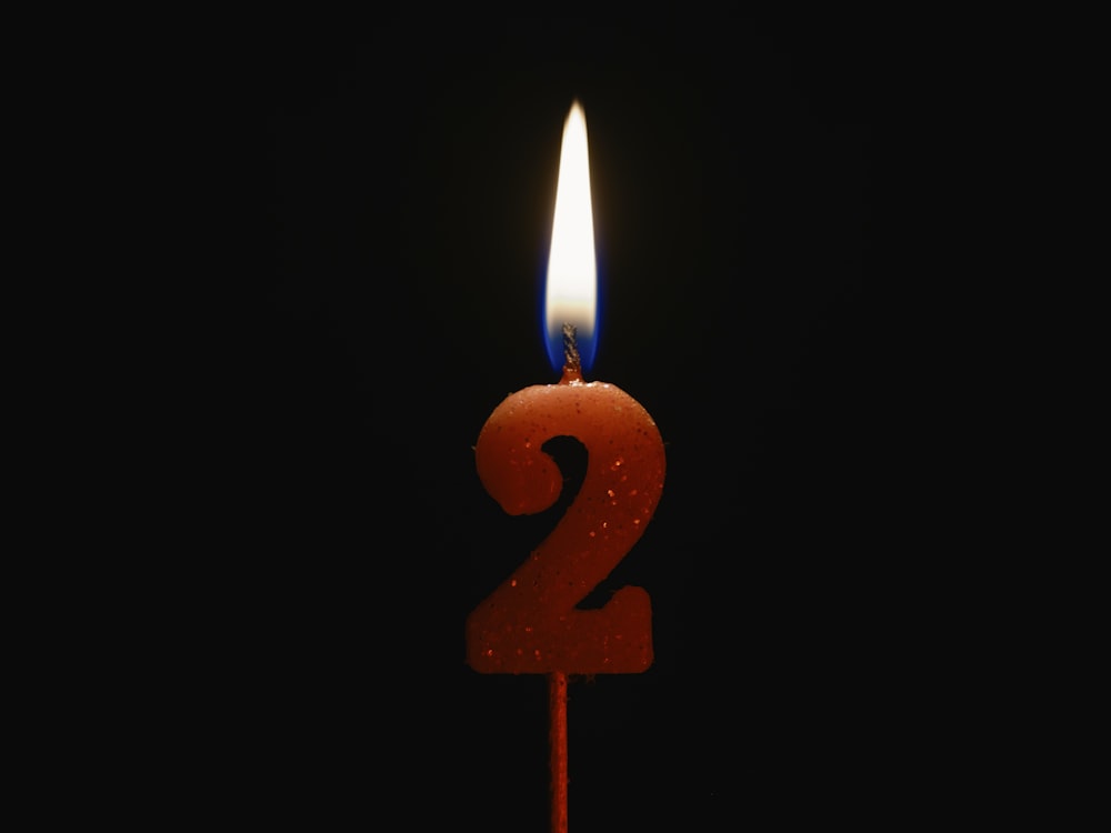 a candle with the number two on it
