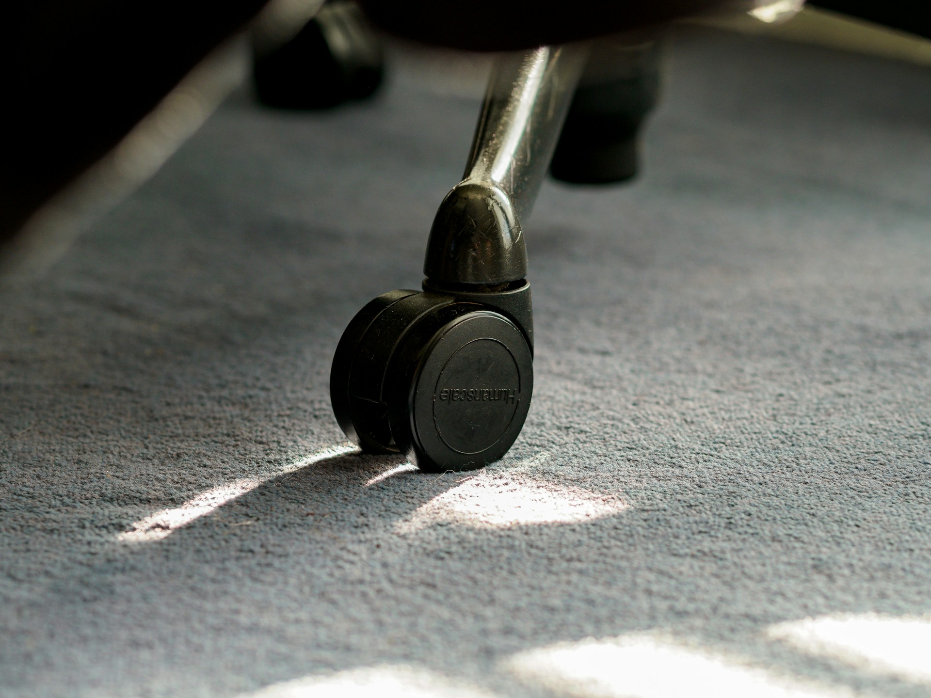 a close up of a metal object on a carpet
