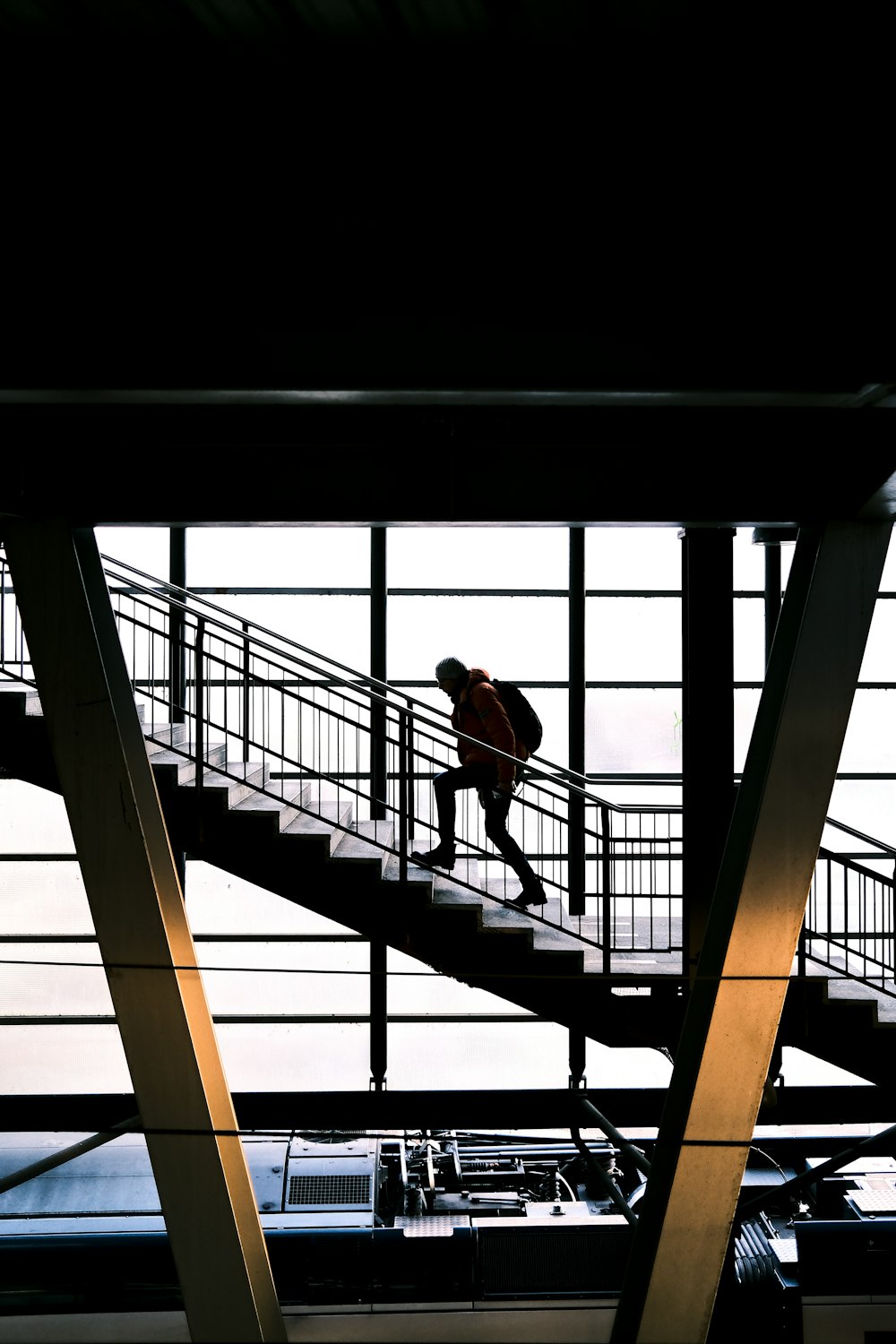 a person walking up a set of stairs