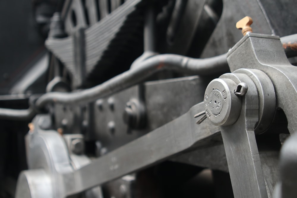 a close up view of the gears of a train