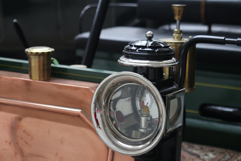 a close up of a clock on a table