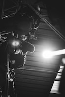 Instructor demonstrating proper use of safety harnesses during a height work training session.