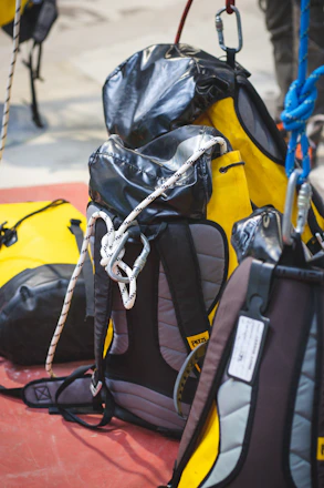 Rope bags with climbing rope and karabiners