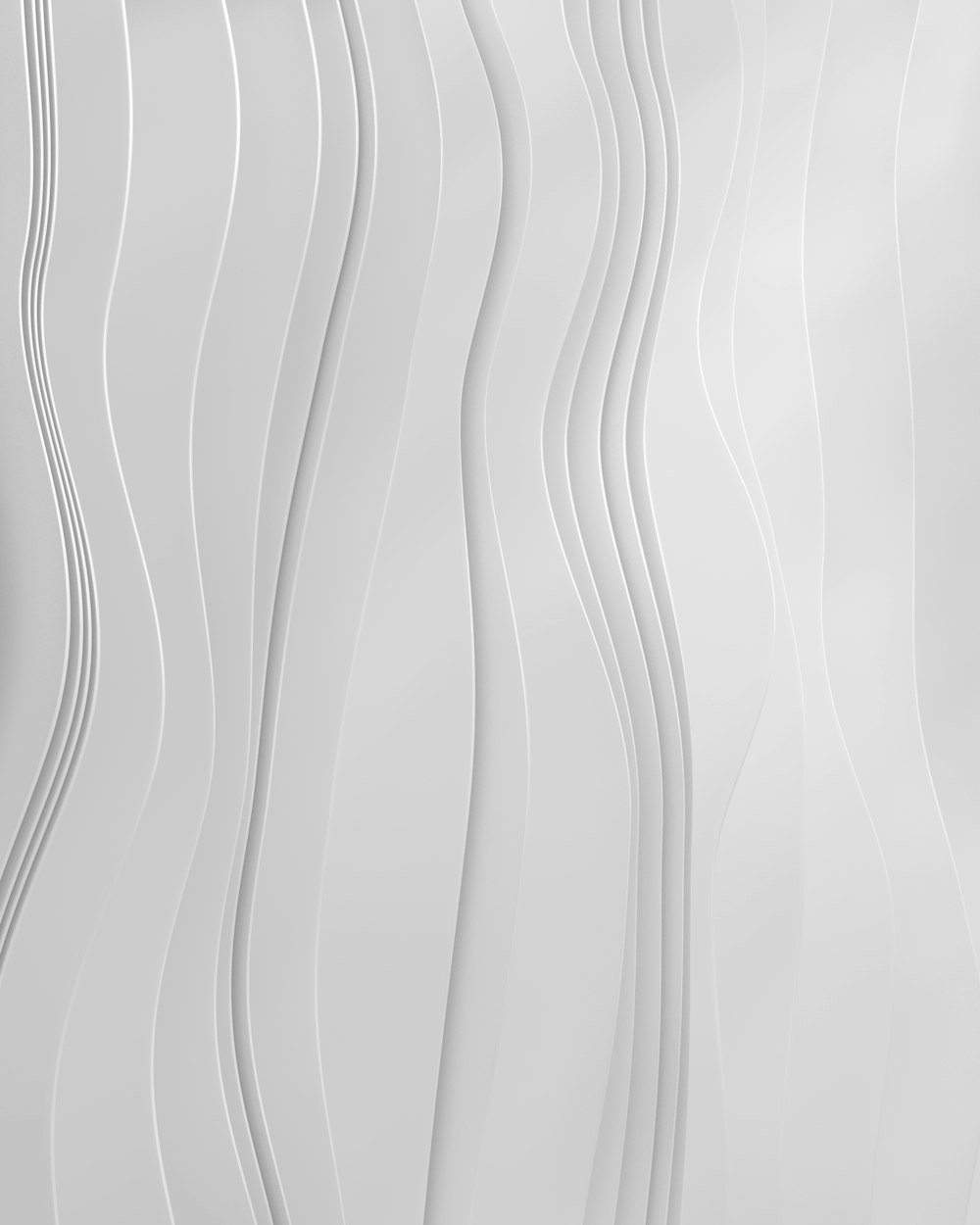 a close up of a white wall with wavy lines