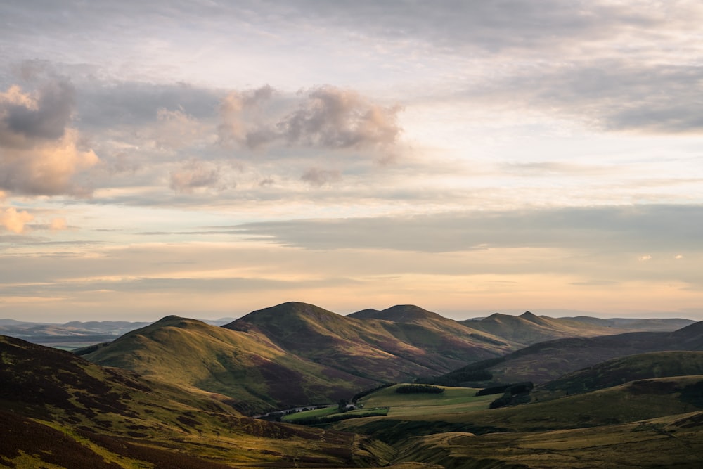 a view of a mountain range at sunset