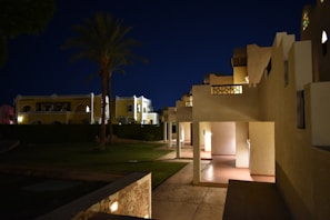 Urban development project showcasing clean lines and mustard yellow highlights at dusk