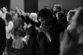 a group of people standing next to each other