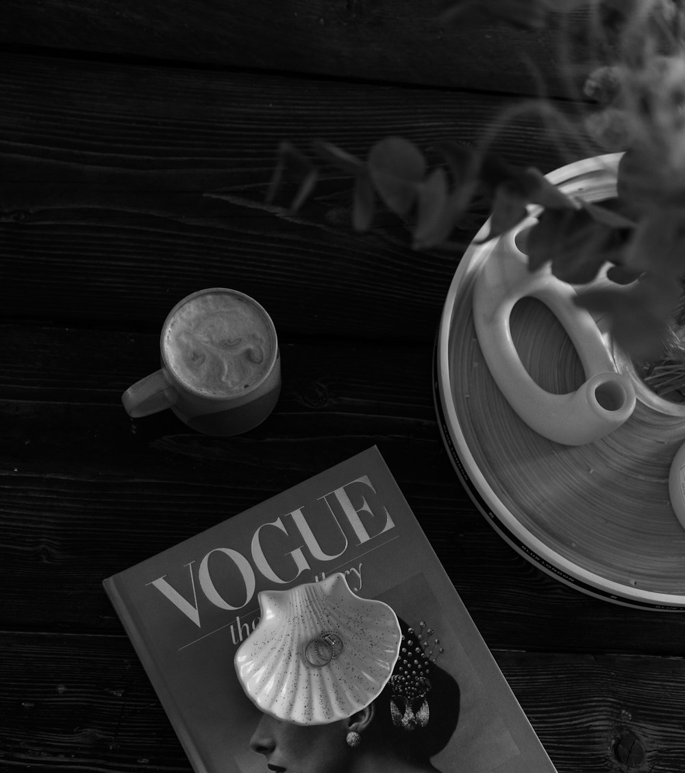 a magazine sitting on top of a wooden table