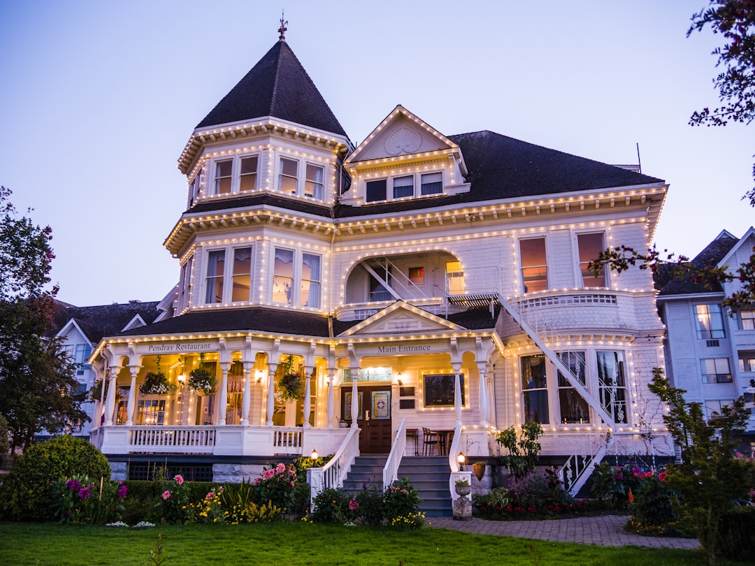 a large white house with a lot of lights on it