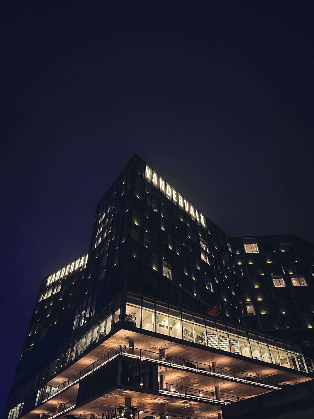 a very tall building lit up at night