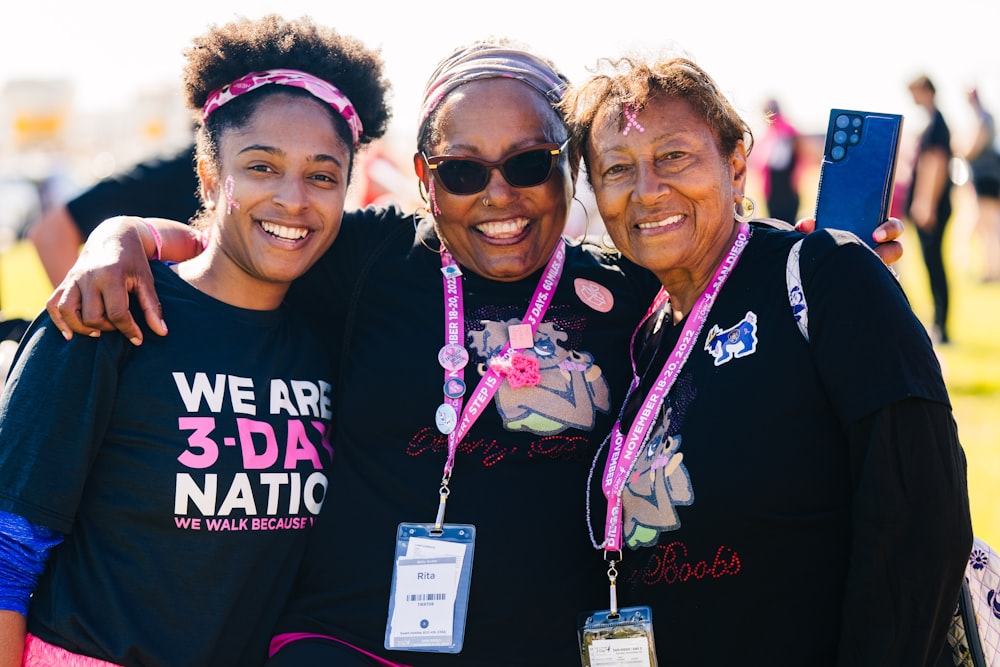 a group of women standing next to each other