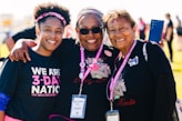 a group of women standing next to each other
