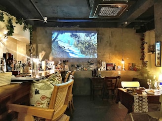 Cozy interior of Ofelia Cafe Deli & Resto with warm lighting and inviting seating.