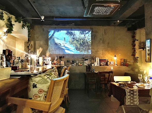 Cozy interior of Ofelia Cafe Deli & Resto with warm lighting and inviting seating.