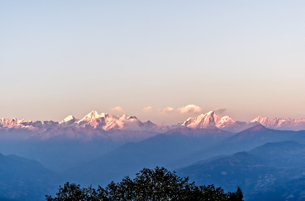 a view of a mountain range at sunset