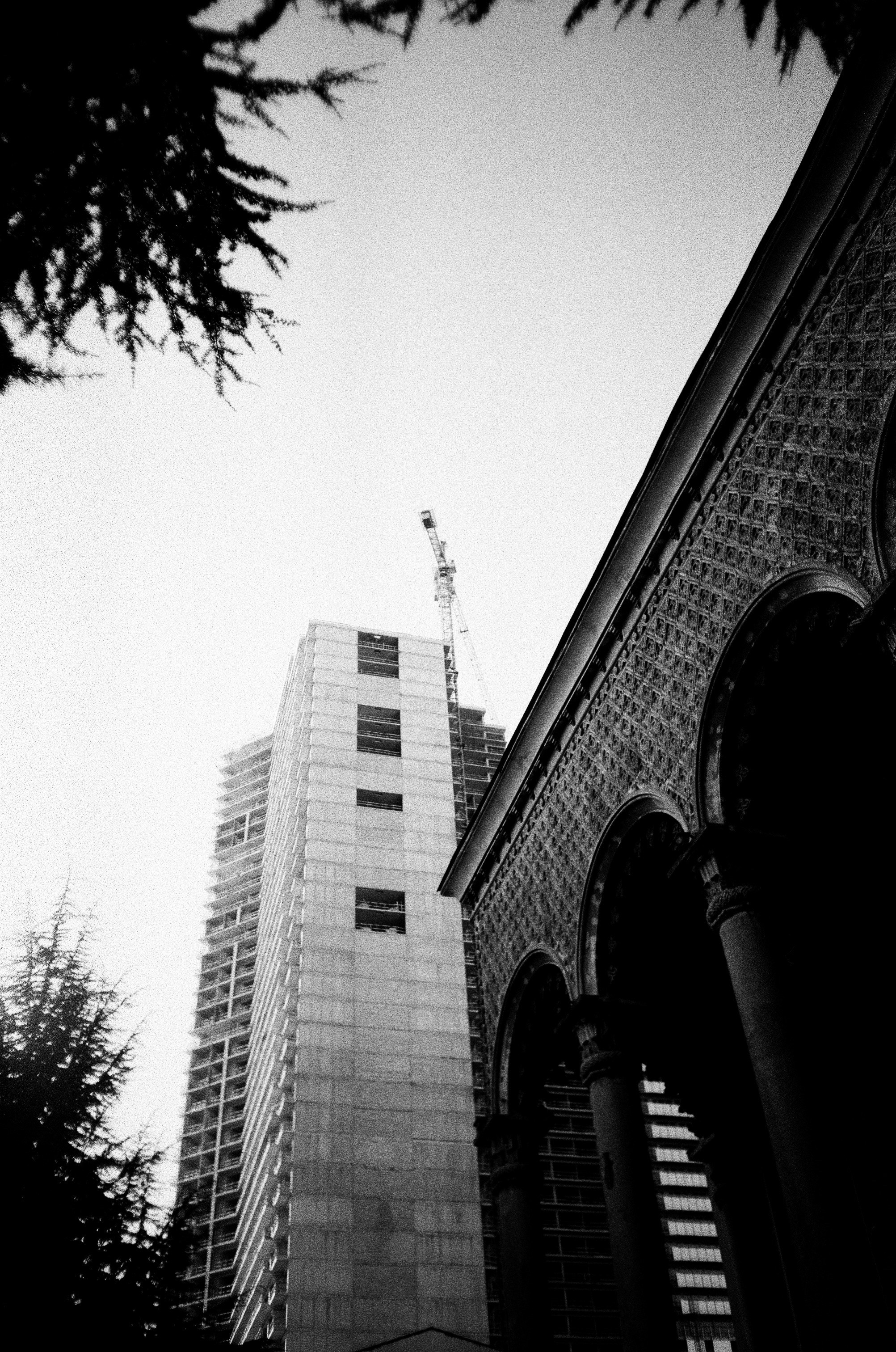 a black and white photo of a tall building