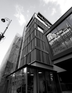 a black and white photo of a tall building