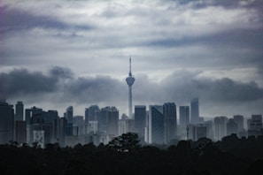 City skyline with connected digital network overlays symbolizing cloud technology.