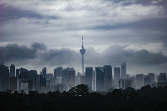 City skyline with connected digital network overlays symbolizing cloud technology.