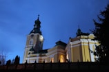 The historic Old Beth-El Baptist church building glowing in the evening light.