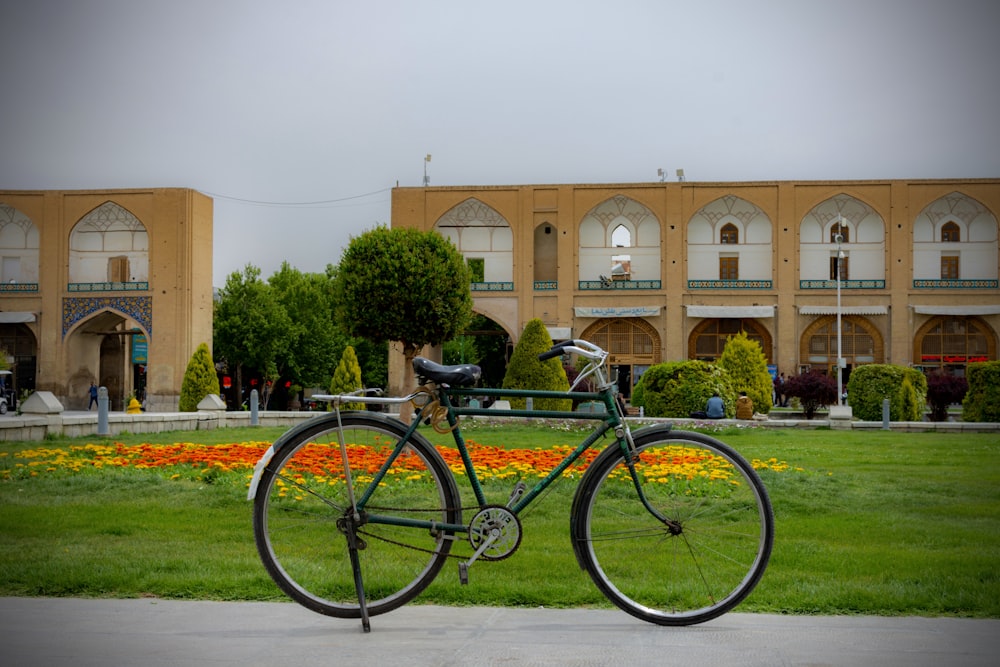 a bike is parked in front of a building