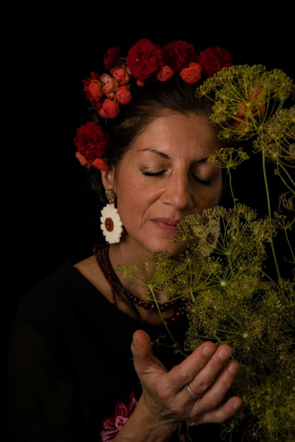 a woman with a wreath of flowers on her head