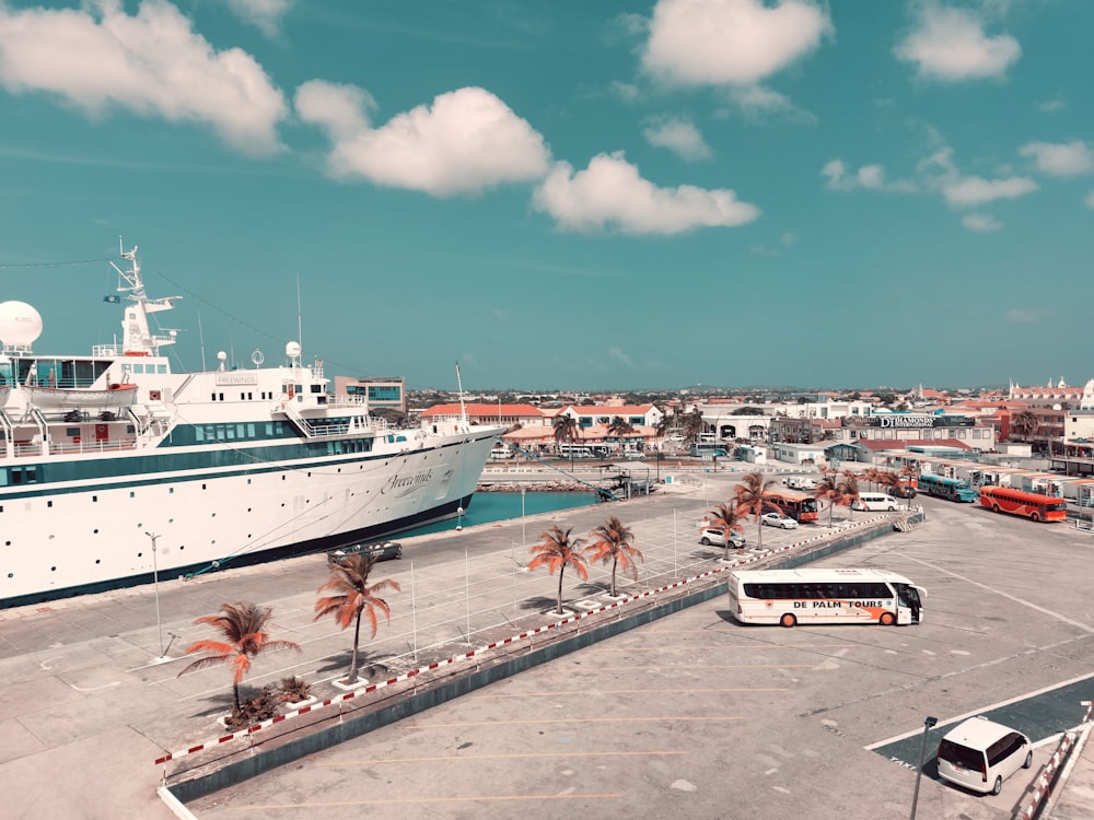 a large cruise ship docked at a port