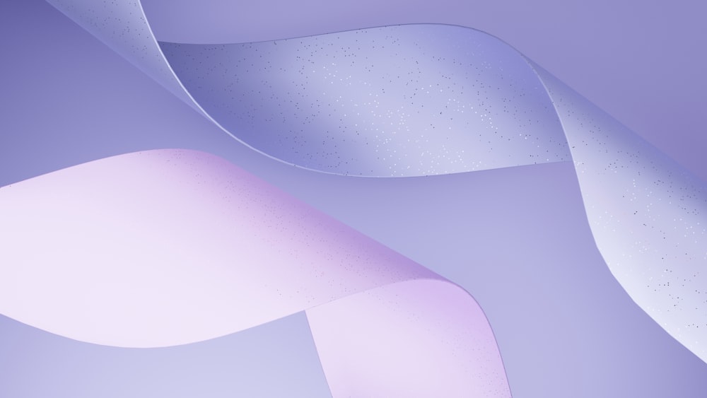 a close up of a purple and white background