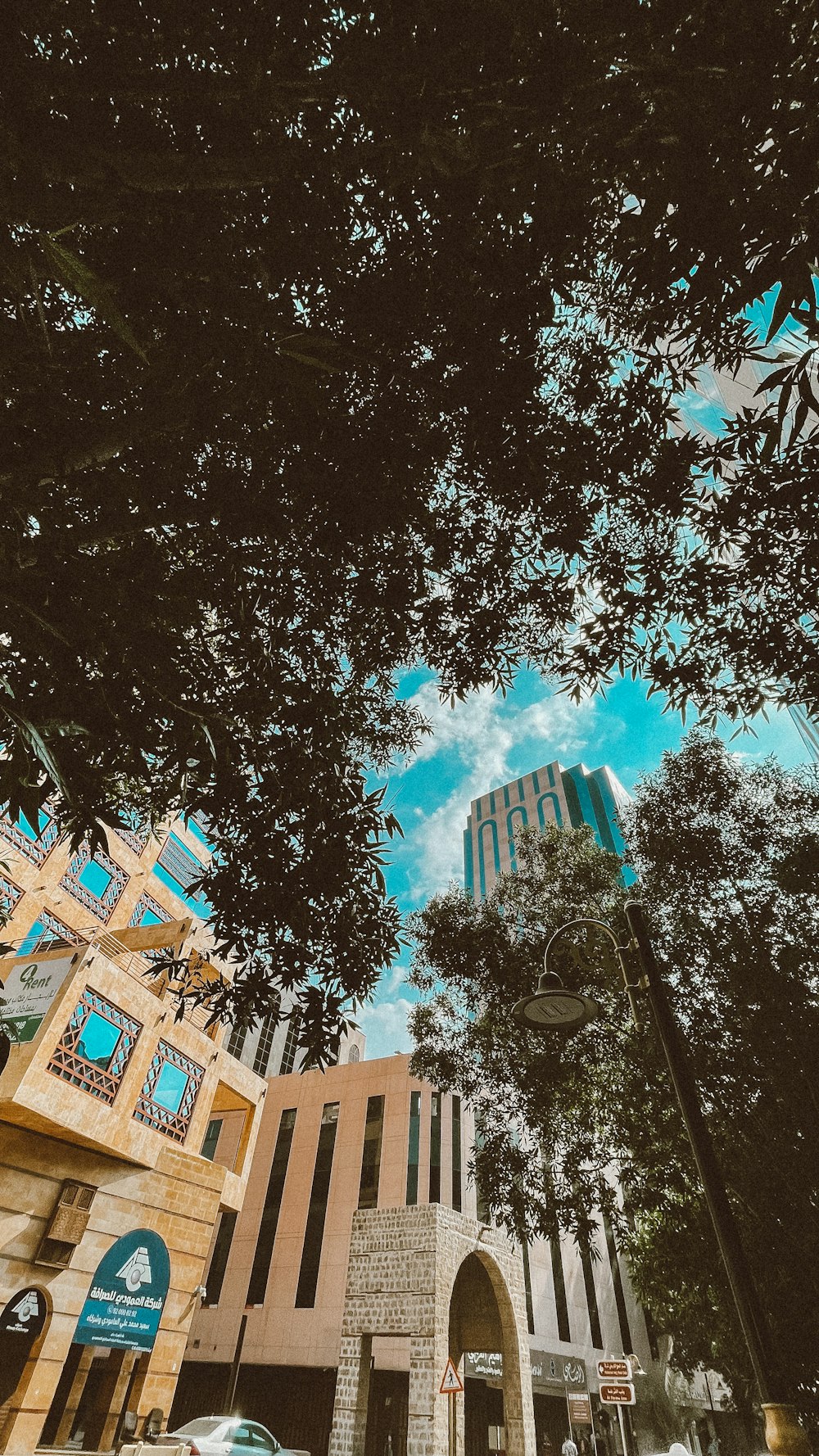 a tall building with a clock on the side of it