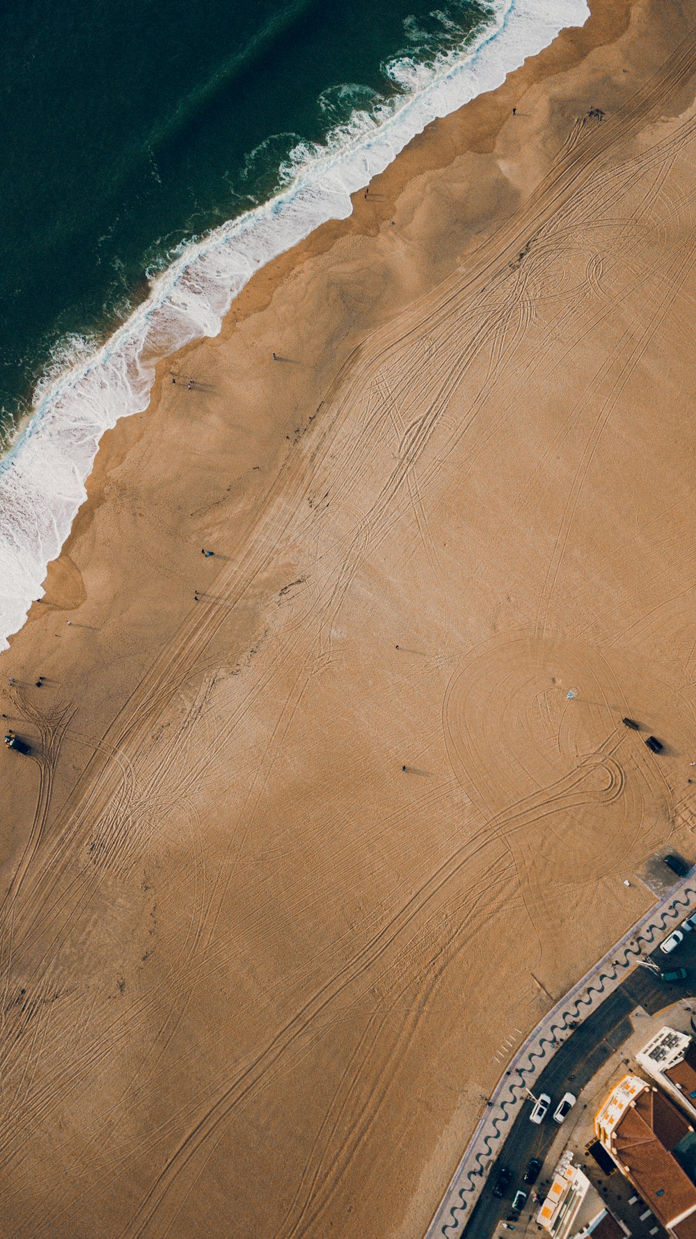 a bird's eye view of a beach and ocean